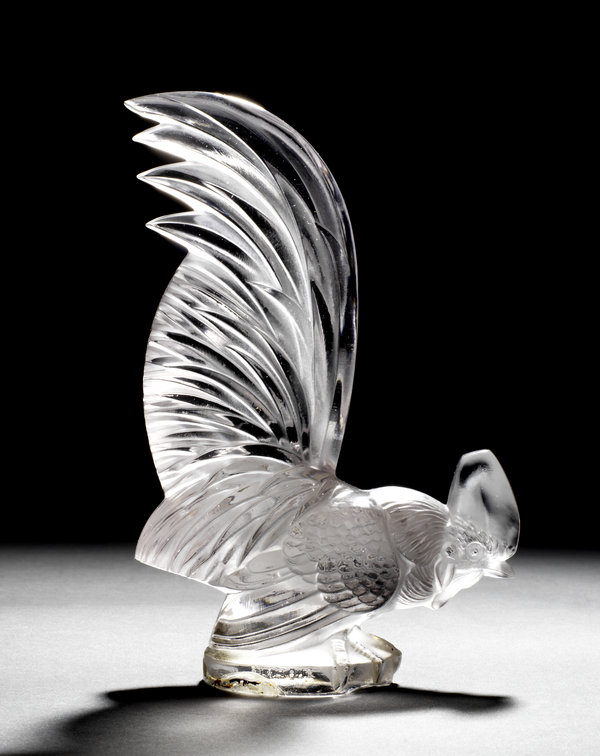 A Coq Nain glass mascot by René Lalique introduced 10 February 1928