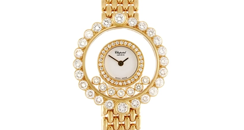 An 18k gold Chopard Happy Diamond bracelet watch. Classic Driver