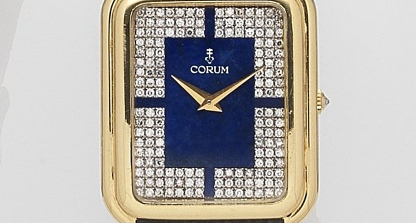 Corum. An 18ct gold and diamond set manual wind wristwatch