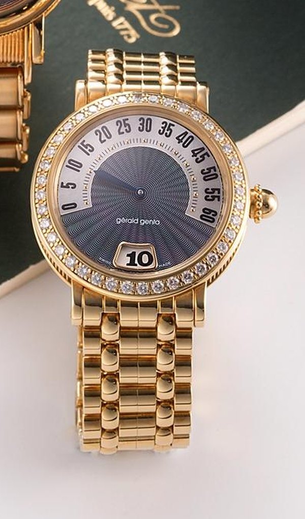 Gerald Genta An 18K gold and diamond set automatic retrograde