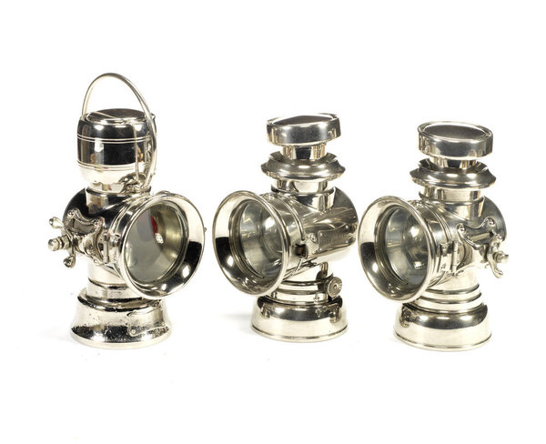 Three Lucas 'King of the Road' oil-illuminating lamps | Classic