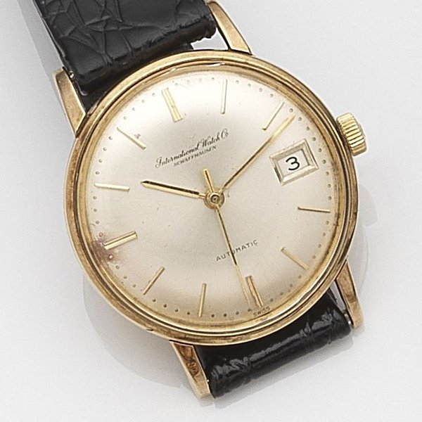 IWC. A 9ct gold automatic calendar wristwatch | Classic Driver Market