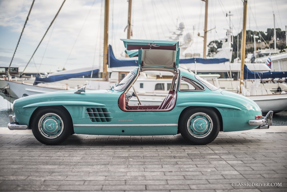 This Mercedes 300SL Gullwing is a cyan-coloured bird of paradise